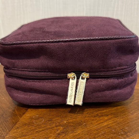 Estee Lauder Handbags - Estee Lauder Plum Cosmetic Case with Gold Accents